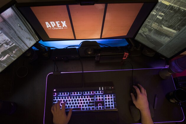 FILE - In this March 6, 2019, file photo a gamer plays Electronic Arts'
