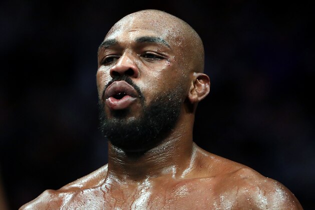 HOUSTON, TEXAS - FEBRUARY 08:  Jon Jones in his fight against Dominick Reyes in their UFC Light Heavyweight Championship bout during UFC 247 at Toyota Center on February 08, 2020 in Houston, Texas. (Photo by Ronald Martinez/Getty Images)