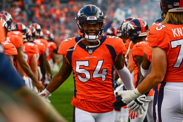 DENVER, CO - AUGUST 18:  Linebacker Brandon Marshall #54 of the Denver Broncos runs onto the field as players are introduced before an NFL preseason game against the Chicago Bears at Broncos Stadium at Mile High on August 18, 2018 in Denver, Colorado. (Photo by Dustin Bradford/Getty Images)