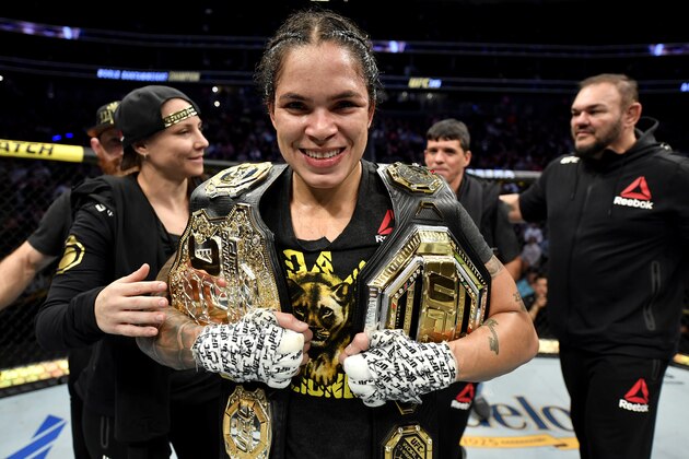 LAS VEGAS, NEVADA - DECEMBER 14:  Amanda Nunes of Brazil celebrates after defeating Germaine de Randamie of Netherlands in their UFC women's bantamweight championship bout during the UFC 245 event at T-Mobile Arena on December 14, 2019 in Las Vegas, Nevada. (Photo by Jeff Bottari/Zuffa LLC)