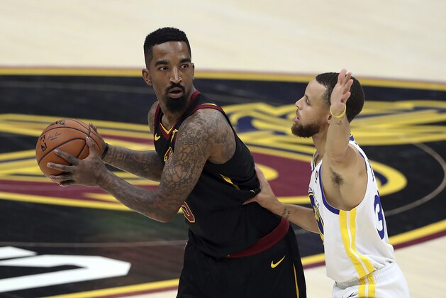 Cleveland Cavaliers' JR Smith id defended by Golden State Warriors' Stephen Curry during the first half of Game 4 of basketball's NBA Finals, Friday, June 8, 2018, in Cleveland. (AP Photo/Carlos Osorio)