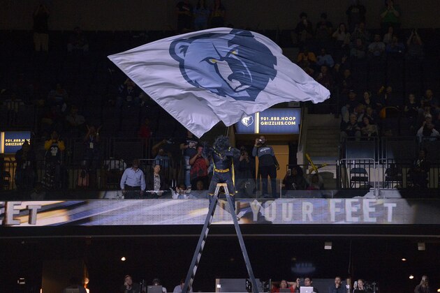 Grizz, mascot for the Memphis Grizzlies, stands on a ladder and waves a flag with the team's logo in the second half of an NBA basketball game against the San Antonio Spurs Friday, Dec. 1, 2017, in Memphis, Tenn. (AP Photo/Brandon Dill) Grizz, mascot for the Memphis Grizzlies, stands on a ladder and waves a flag with the team's logo in the second half of an NBA basketball game against the San Antonio Spurs Friday, Dec. 1, 2017, in Memphis, Tenn. (AP Photo/Brandon Dill)