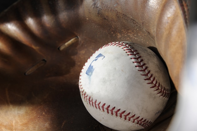 GLENDALE, AZ - FEBRUARY 19: A batting practice baseball rests in a catchers mitt during Chicago White Sox spring training workouts on February 19, 2014 at The Ballpark at Camelback Ranch in Glendale, Arizona. (Photo by Ron Vesely/MLB Photos via Getty Images) *** GLENDALE, AZ - FEBRUARY 19: A batting practice baseball rests in a catchers mitt during Chicago White Sox spring training workouts on February 19, 2014 at The Ballpark at Camelback Ranch in Glendale, Arizona. (Photo by Ron Vesely/MLB Photos via Getty Images) ***