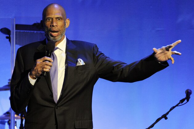 FILE - This Oct. 11, 2014, file photo shows retired basketball Hall of Famer Kareem Abdul-Jabbar addressing the audience during the 2014 Carousel of Hope Ball in Beverly Hills, Calif. Abdul-Jabbar has briefly returned to the hospital two weeks after undergoing quadruple coronary bypass surgery, but his business manager said Wednesday, April 29, 2015, it was just a precaution and the NBA's career scoring leader is doing fine. (Photo by Chris Pizzello/Invision/AP,File)