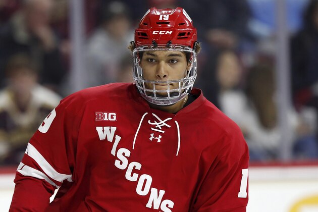 FILE - In this Oct. 11, 2019, file photo, Wisconsin's K'Andre Miller is shown during an NCAA college hockey game against Boston College in Chestnut Hill, Mass. The New York Rangers announced Monday, March 16, 2020, that the team has agreed to terms with defenseman K'Andre Miler. (AP Photo/Winslow Townson, File)