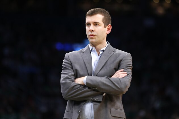 Boston Celtics head coach Brad Stevens looks on from the sidelines with crossed arms during the first half of an NBA basketball game against the Phoenix Suns, Saturday, Jan. 18, 2020, in Boston. (AP Photo/Mary Schwalm)