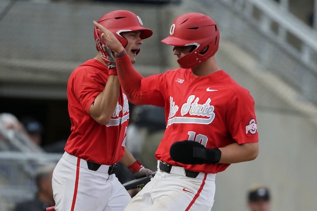 Ohio State's Dillon Dingler, right, celebrates with teammate Brent Todys, after Dingler scored on a sacrifice fly by Conner Pohl in the eighth inning of the NCAA Big Ten baseball championship game in Omaha, Neb., Sunday, May 26, 2019. Ohio State won 3-1. (AP Photo/Nati Harnik) Ohio State's Dillon Dingler, right, celebrates with teammate Brent Todys, after Dingler scored on a sacrifice fly by Conner Pohl in the eighth inning of the NCAA Big Ten baseball championship game in Omaha, Neb., Sunday, May 26, 2019. Ohio State won 3-1. (AP Photo/Nati Harnik)