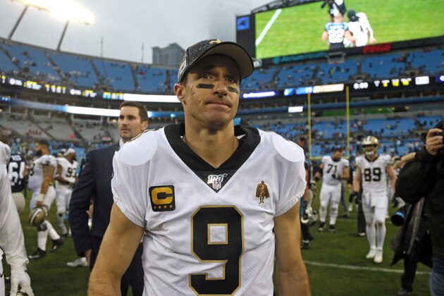 New Orleans Saints quarterback Drew Brees (9) leaves the field following an NFL football game against the Carolina Panthers in Charlotte, N.C., Sunday, Dec. 29, 2019. (AP Photo/Brian Blanco)