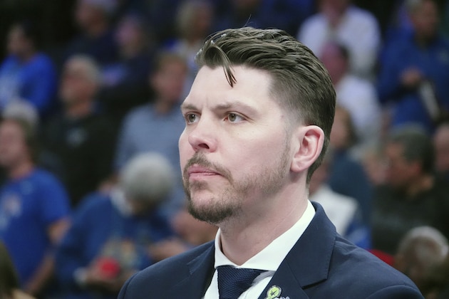 Memphis coach Mike Miller watches his team in the first half of an NCAA college basketball game against Houston Saturday, Feb. 22, 2020, in Memphis, Tenn. (AP Photo/Karen Pulfer Focht)