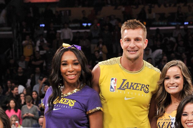 LOS ANGELES, CALIFORNIA - NOVEMBER 19: Venus Williams, Rob Gronkowski, James Corden and Ian Karmel pose for a photo with the Laker Girls after performing during halftime at a basketball game between the Los Angeles Lakers and the Oklahoma City Thunder at Staples Center on November 19, 2019 in Los Angeles, California. (Photo by Allen Berezovsky/Getty Images)