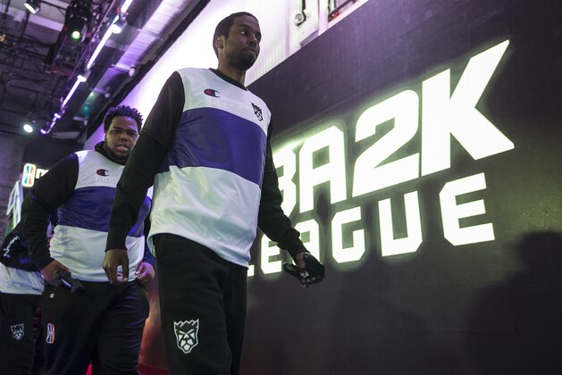 LONG ISLAND CITY, NY - MAY 16: YUSUF_SCARBS of Kings Guard Gaming walks onto the stage before the game against Bucks Gaming during Week 5 of the NBA 2K League regular season on May 16, 2019 at the NBA 2K Studio in Long Island City, New York. NOTE TO USER: User expressly acknowledges and agrees that, by downloading and/or using this photograph, user is consenting to the terms and conditions of the Getty Images License Agreement. Mandatory Copyright Notice: Copyright 2019 NBAE (Photo by Michelle Farsi/NBAE via Getty Images)