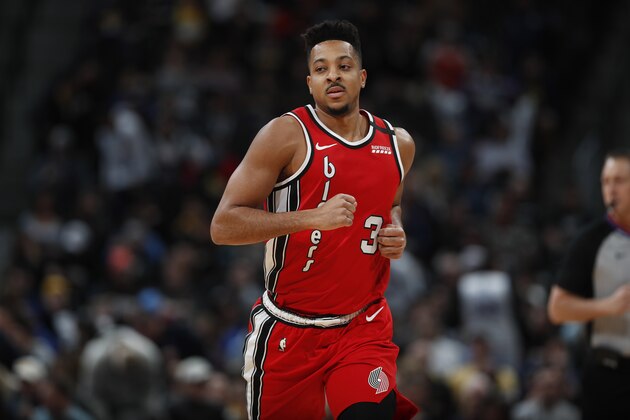 Portland Trail Blazers guard CJ McCollum (3) in the first half of an NBA basketball game Tuesday, Feb. 4, 2020, in Denver. (AP Photo/David Zalubowski)