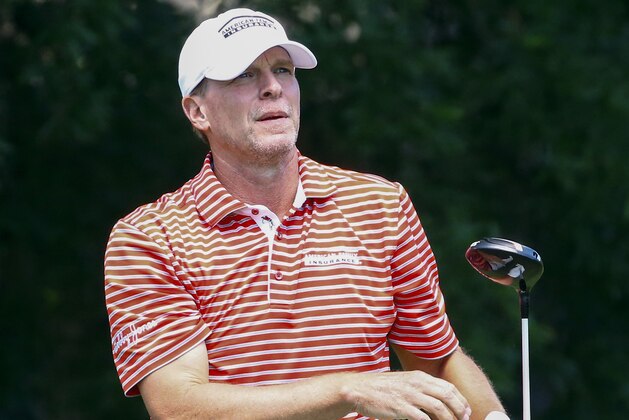 Steve Stricker watches his tee shot on the ninth hole during the final round of the Regions Tradition Champions Tour golf tournament, Monday, May 13, 2019, in Birmingham, Ala. (AP Photo/Butch Dill)