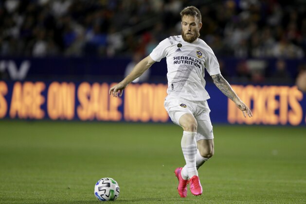 LA Galaxy forward Aleksandar Katai controls the ball against the Vancouver Whitecaps during the second half of an MLS soccer match in Carson, Calif., Saturday, March 7, 2020. (AP Photo/Alex Gallardo)
