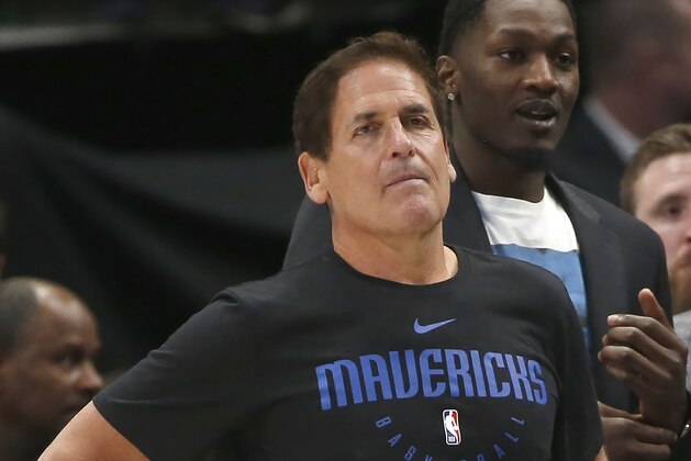 Dallas Mavericks owner Mark Cuban looks on as the Mavericks play the Denver Nuggets during the second half of an NBA basketball game, Wednesday, March 11, 2020, in Dallas. The Mavericks won 113-97. (AP Photo/Ron Jenkins) Dallas Mavericks owner Mark Cuban looks on as the Mavericks play the Denver Nuggets during the second half of an NBA basketball game, Wednesday, March 11, 2020, in Dallas. The Mavericks won 113-97. (AP Photo/Ron Jenkins)