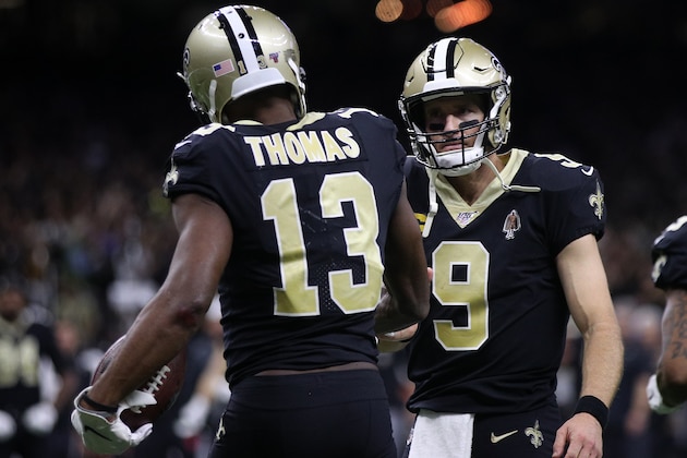 NEW ORLEANS, LOUISIANA - OCTOBER 27: Drew Brees #9 of the New Orleans Saints and Michael Thomas #13 of the New Orleans Saints celebrate after a touchdown against the Arizona Cardinals at Mercedes Benz Superdome on October 27, 2019 in New Orleans, Louisiana. (Photo by Chris Graythen/Getty Images)