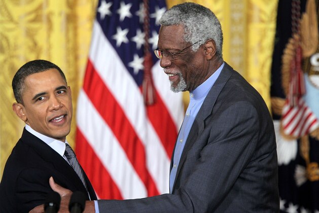 WASHINGTON, DC - FEBRUARY 15:  Former Boston Celtics captain Bill Russell (R) shares a moment with U.S. President Barack Obama during the 2010 Medal of Freedom presentation ceremony at the East Room of the White House February 15, 2011 in Washington, DC. Obama presented the medal, the highest honor awarded to civilians, to twelve pioneers in sports, labor, politics and arts.  (Photo by Alex Wong/Getty Images)
