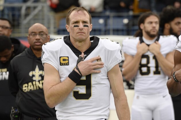 New Orleans Saints quarterback Drew Brees stands for the national anthem before the first half of an NFL football game between the Saints and the Tennessee Titans Sunday, Dec. 22, 2019, in Nashville, Tenn. (AP Photo/Mark Zaleski)