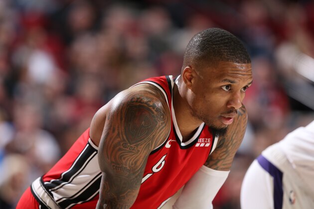 PORTLAND, OR - MARCH 10:  Damian Lillard #0 of the Portland Trail Blazers looks on against the Phoenix Suns on March 10, 2020 at the Moda Center Arena in Portland, Oregon. NOTE TO USER: User expressly acknowledges and agrees that, by downloading and or using this photograph, user is consenting to the terms and conditions of the Getty Images License Agreement. Mandatory Copyright Notice: Copyright 2020 NBAE (Photo by Sam Forencich/NBAE via Getty Images)