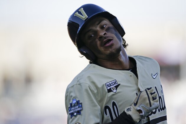 Vanderbilt's Austin Martin (16) reacts after being called out at first base during the third inning against Michigan in Game 3 of the NCAA College World Series baseball finals in Omaha, Neb., Wednesday, June 26, 2019. (AP Photo/Nati Harnik) Vanderbilt's Austin Martin (16) reacts after being called out at first base during the third inning against Michigan in Game 3 of the NCAA College World Series baseball finals in Omaha, Neb., Wednesday, June 26, 2019. (AP Photo/Nati Harnik)