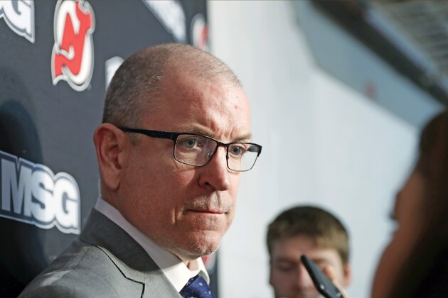 New Jersey Devils interim general manager Tom Fitzgerald anwers reporters' questions after the Devils announced that captain Andy Greene was traded to the New York Islanders, Sunday, Feb. 16, 2020, before an NHL hockey game in Newark, N.J. Greene had been a member of the Devils for his entire 14-year pro career and served as the team captain for the past five seasons. (AP Photo/Kathy Willens) New Jersey Devils interim general manager Tom Fitzgerald anwers reporters' questions after the Devils announced that captain Andy Greene was traded to the New York Islanders, Sunday, Feb. 16, 2020, before an NHL hockey game in Newark, N.J. Greene had been a member of the Devils for his entire 14-year pro career and served as the team captain for the past five seasons. (AP Photo/Kathy Willens)