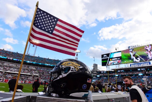 JACKSONVILLE, FLORIDA - DECEMBER 01: An American flag waves next to a Jacksonville Jaguars helmet during a game against the Tampa Bay Buccaneers at TIAA Bank Field on December 01, 2019 in Jacksonville, Florida. (Photo by Julio Aguilar/Getty Images) JACKSONVILLE, FLORIDA - DECEMBER 01: An American flag waves next to a Jacksonville Jaguars helmet during a game against the Tampa Bay Buccaneers at TIAA Bank Field on December 01, 2019 in Jacksonville, Florida. (Photo by Julio Aguilar/Getty Images)