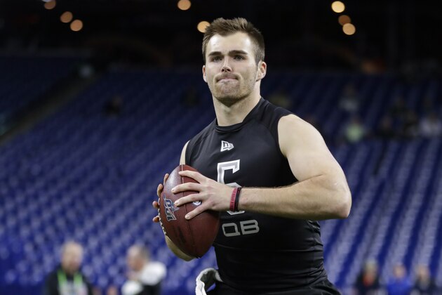 Georgia quarterback Jake Fromm runs a drill at the NFL football scouting combine in Indianapolis, Thursday, Feb. 27, 2020. (AP Photo/Michael Conroy)