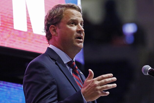 Lane Kiffin speaks to Mississippi fans after being introduced as the new NCAA college football coach during a public introduction at The Pavilion, a multipurpose arena on the campus in Oxford, Miss., Monday, Dec. 9, 2019. Kiffin was previously, the football coach for three years at Florida Atlantic. (AP Photo/Rogelio V. Solis)