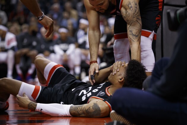 TORONTO, ON - JANUARY 22: Patrick McCaw #22 of the Toronto Raptors lays injured on the floor during their NBA game against the Philadelphia 76ers at Scotiabank Arena on January 22, 2020 in Toronto, Canada. NOTE TO USER: User expressly acknowledges and agrees that, by downloading and or using this photograph, User is consenting to the terms and conditions of the Getty Images License Agreement. (Photo by Cole Burston/Getty Images) TORONTO, ON - JANUARY 22: Patrick McCaw #22 of the Toronto Raptors lays injured on the floor during their NBA game against the Philadelphia 76ers at Scotiabank Arena on January 22, 2020 in Toronto, Canada. NOTE TO USER: User expressly acknowledges and agrees that, by downloading and or using this photograph, User is consenting to the terms and conditions of the Getty Images License Agreement. (Photo by Cole Burston/Getty Images)