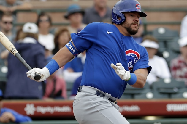 Chicago Cubs' Kyle Schwarber hits against the San Francisco Giants during the first inning of a spring training baseball game Tuesday, March 10, 2020, in Scottsdale, Ariz. (AP Photo/Matt York)