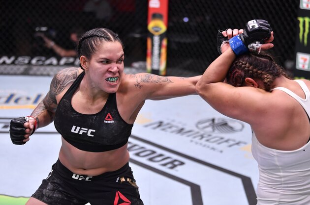 LAS VEGAS, NEVADA - JUNE 06: (L-R) Amanda Nunes of Brazil punches Felicia Spencer of Canada in their UFC featherweight championship bout during the UFC 250 event at UFC APEX on June 06, 2020 in Las Vegas, Nevada. (Photo by Jeff Bottari/Zuffa LLC) LAS VEGAS, NEVADA - JUNE 06: (L-R) Amanda Nunes of Brazil punches Felicia Spencer of Canada in their UFC featherweight championship bout during the UFC 250 event at UFC APEX on June 06, 2020 in Las Vegas, Nevada. (Photo by Jeff Bottari/Zuffa LLC)