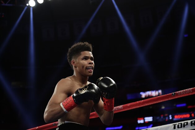 Shakur Stevenson fights Carlos Suarez, of Argentina, during the first round of a featherweight boxing match Saturday, May 20, 2017, in New York. Stevenson stopped Suarez in the first round. (AP Photo/Frank Franklin II) Shakur Stevenson fights Carlos Suarez, of Argentina, during the first round of a featherweight boxing match Saturday, May 20, 2017, in New York. Stevenson stopped Suarez in the first round. (AP Photo/Frank Franklin II)