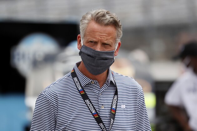DARLINGTON, SOUTH CAROLINA - MAY 17: NASCAR President Steve Phelps walks the grid prior to the NASCAR Cup Series The Real Heroes 400 at Darlington Raceway on May 17, 2020 in Darlington, South Carolina. NASCAR resumes the season after the nationwide lockdown due to the ongoing coronavirus (COVID-19).  (Photo by Chris Graythen/Getty Images)