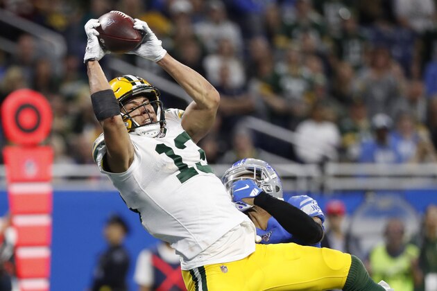 Green Bay Packers wide receiver Allen Lazard (13), defended by Detroit Lions cornerback Darius Slay, catches a 28-yard pass for a touchdown during the second half of an NFL football game, Sunday, Dec. 29, 2019, in Detroit. (AP Photo/Rick Osentoski) Green Bay Packers wide receiver Allen Lazard (13), defended by Detroit Lions cornerback Darius Slay, catches a 28-yard pass for a touchdown during the second half of an NFL football game, Sunday, Dec. 29, 2019, in Detroit. (AP Photo/Rick Osentoski)