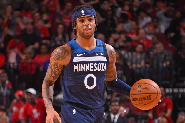 HOUSTON, TX - MARCH 10: D'Angelo Russell #0 of the Minnesota Timberwolves handles the ball during the game against the Houston Rockets on March 10, 2020 at the Toyota Center in Houston, Texas. NOTE TO USER: User expressly acknowledges and agrees that, by downloading and or using this photograph, User is consenting to the terms and conditions of the Getty Images License Agreement. Mandatory Copyright Notice: Copyright 2020 NBAE (Photo by Bill Baptist/NBAE via Getty Images)