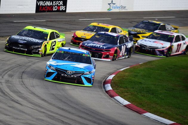 MARTINSVILLE, VIRGINIA - OCTOBER 27: Martin Truex Jr, driver of the #19 Auto Owners Insurance Toyota, leads a pack of cars during the Monster Energy NASCAR Cup Series First Data 500 at Martinsville Speedway on October 27, 2019 in Martinsville, Virginia. (Photo by Jared C. Tilton/Getty Images)