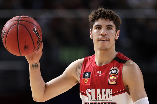 LaMelo Ball of the Illawarra Hawks carries the ball up during their game against the Sydney Kings in the Australian Basketball League in Sydney, Sunday, Nov. 17, 2019. (AP Photo/Rick Rycroft) LaMelo Ball of the Illawarra Hawks carries the ball up during their game against the Sydney Kings in the Australian Basketball League in Sydney, Sunday, Nov. 17, 2019. (AP Photo/Rick Rycroft)