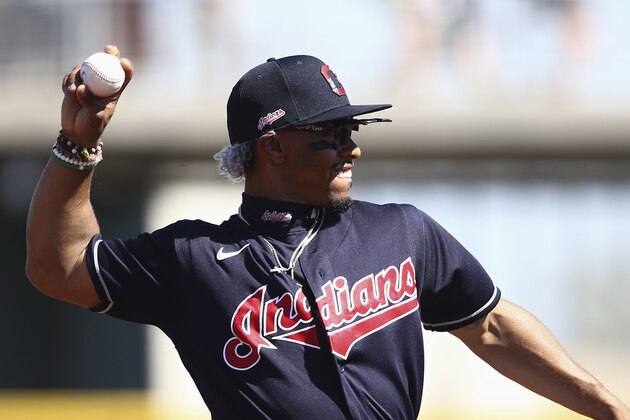 Cleveland Indians shortstop Francisco Lindor warms up during the second inning of a spring training baseball game against the Chicago Cubs Saturday, March 7, 2020, in Goodyear, Ariz. The Cubs defeated the Indians 8-5. (AP Photo/Ross D. Franklin)