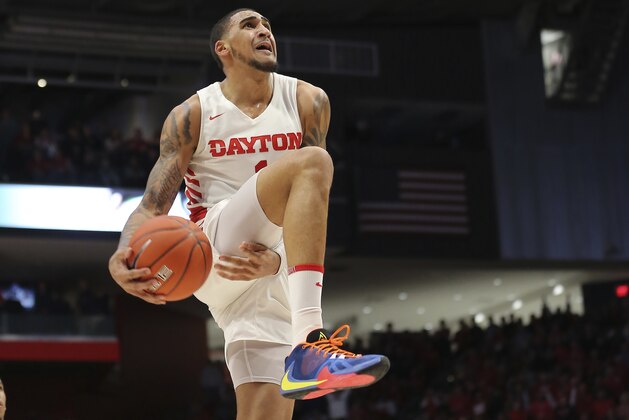 Dayton's Obi Toppin goes up to dunk during the second half of an NCAA college basketball game against George Washington, Saturday, March 7, 2020, in Dayton, Ohio. (AP Photo/Tony Tribble)