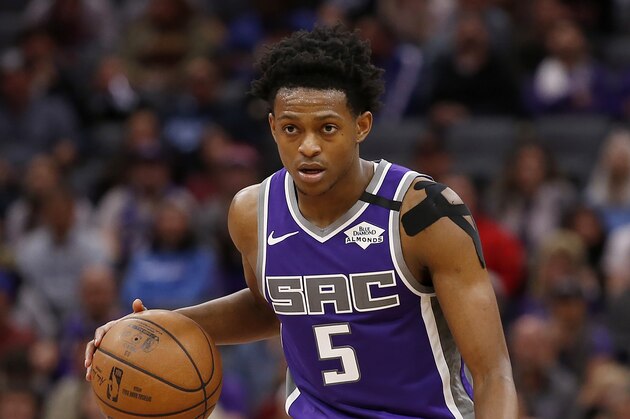 Sacramento Kings guard De'Aaron Fox dribbles down court during the second half of an NBA basketball game against the Toronto Raptors in Sacramento, Calif., Sunday, March 8, 2020. The Raptors won 118-113. (AP Photo/Rich Pedroncelli)