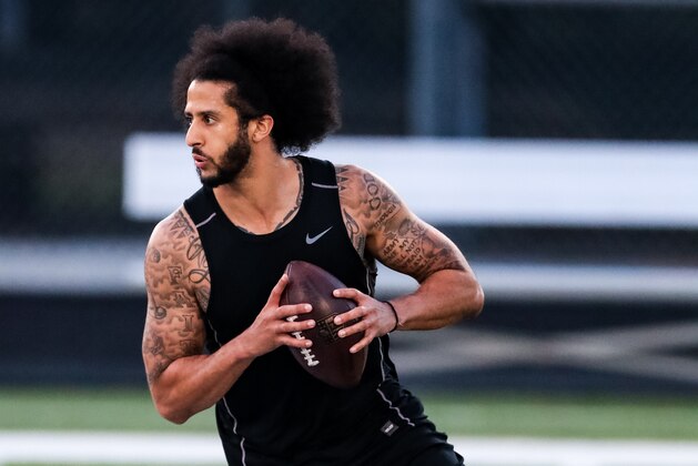 RIVERDALE, GA - NOVEMBER 16: Colin Kaepernick looks to pass during his NFL workout held at Charles R Drew high school on November 16, 2019 in Riverdale, Georgia. (Photo by Carmen Mandato/Getty Images)