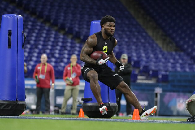 Florida State running back Cam Akers runs a drill at the NFL football scouting combine in Indianapolis, Friday, Feb. 28, 2020. (AP Photo/Michael Conroy)