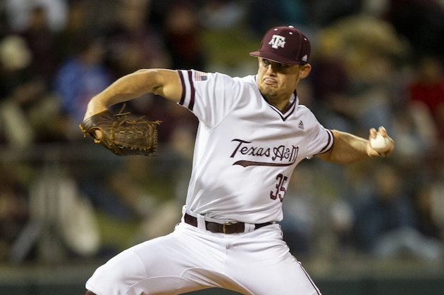 Texas A&M's Asa Lacy (35) throws a strike against a Miami (Oh) batter during an NCAA baseball game on Friday, Feb. 14, 2020, in College Station, Texas. (AP Photo/Sam Craft)