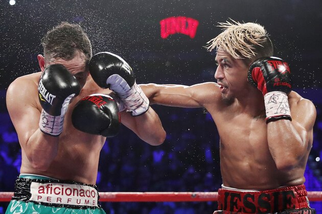 Jessie Magdaleno hits Nonito Donaire, of the Philippines, during their WBO junior featherweight title boxing match Saturday, Nov. 5, 2016, in Las Vegas. (AP Photo/Isaac Brekken) Jessie Magdaleno hits Nonito Donaire, of the Philippines, during their WBO junior featherweight title boxing match Saturday, Nov. 5, 2016, in Las Vegas. (AP Photo/Isaac Brekken)