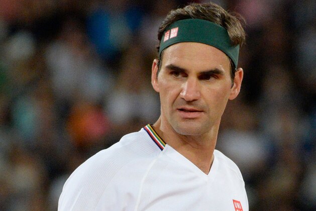 Switzerland's Roger Federer reacts during their tennis match at The Match in Africa at the Cape Town Stadium, in Cape Town on February 7, 2020. (Photo by RODGER BOSCH / AFP) (Photo by RODGER BOSCH/AFP via Getty Images)