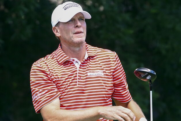 Steve Stricker watches his tee shot on the ninth hole during the final round of the Regions Tradition Champions Tour golf tournament, Monday, May 13, 2019, in Birmingham, Ala. (AP Photo/Butch Dill)