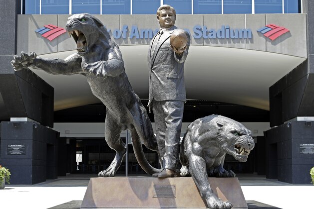 A statue of former Carolina Panthers owner Jerry Richardson stands outside an entrance to Bank of America Stadium in Charlotte, N.C., Tuesday, July 10, 2018. New owner David Tepper said during a news conference at the stadium Tuesday that he is contractually obligated to retain the statue. (AP Photo/Chuck Burton) A statue of former Carolina Panthers owner Jerry Richardson stands outside an entrance to Bank of America Stadium in Charlotte, N.C., Tuesday, July 10, 2018. New owner David Tepper said during a news conference at the stadium Tuesday that he is contractually obligated to retain the statue. (AP Photo/Chuck Burton)