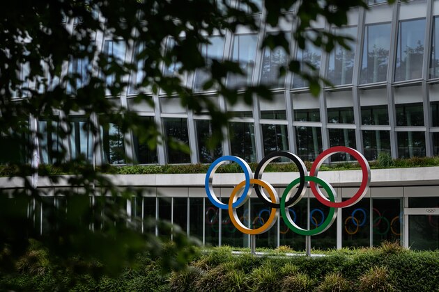 A picture taken on June 8, 2020 shows the Olympic rings logo at the entrance of the headquarters of the International Olympic Committee (IOC) in Lausanne amid the COVID-19 crisis, caused by the novel coronavirus. - The International Olympic Committee (IOC) Executive Board will meet remotely by videoconference on June 10, 2020 to report on the Tokyo 2020 and Paris 2024 Olympics. (Photo by Fabrice COFFRINI / AFP) (Photo by FABRICE COFFRINI/AFP via Getty Images)