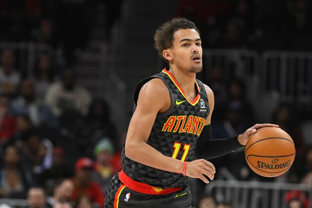 Atlanta Hawks guard Trae Young (11) dribbles upcourt during an NBA basketball game against the Charlotte Hornets, Monday, March 9, 2020, in Atlanta. (AP Photo/John Amis) Atlanta Hawks guard Trae Young (11) dribbles upcourt during an NBA basketball game against the Charlotte Hornets, Monday, March 9, 2020, in Atlanta. (AP Photo/John Amis)