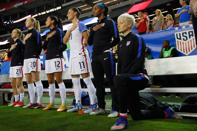 ATLANTA, GA - SEPTEMBER 18:  Megan Rapinoe #15 kneels during the National Anthem prior to the match between the United States and the Netherlands at Georgia Dome on September 18, 2016 in Atlanta, Georgia.  (Photo by Kevin C. Cox/Getty Images)